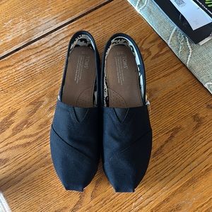 Brand new never been worn Toms